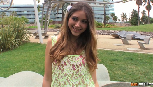 Pretty teen chick shows her tats in the park porn pics