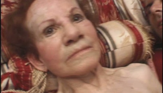 Aroused dude closes his eyes while Granny Gigi rides on his cock porn pics