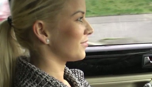 Aroused lover mauls his mistress's legs right in the car porn pics