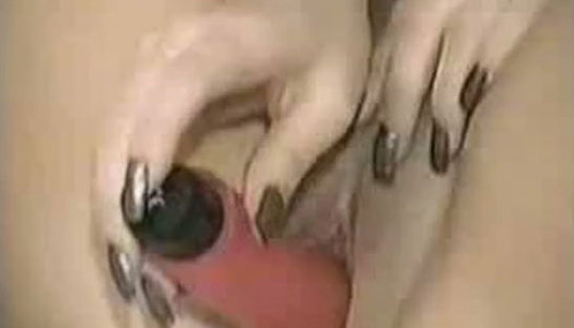 Naughty black haired cutie with pigtails drills her quim with a sex toy porn pics