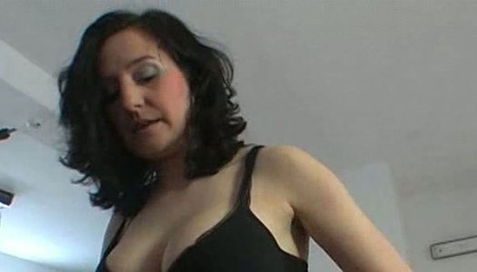 Sexy brunette denudes her tits and gets on her knees to blow a cock porn pics