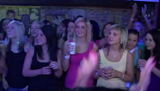 Solid built stripper performs a hot show at the club porn pics