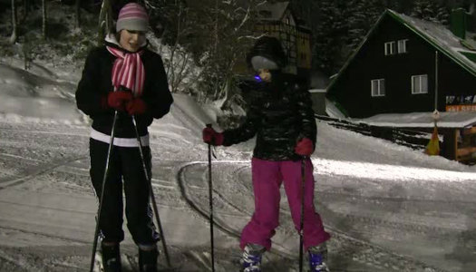 Playful teens Linda and Lilly are passionately kissing while skiing at night porn pics