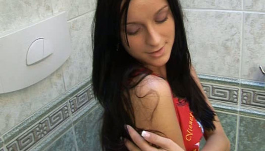 Kinky babe Ella wanks in a toilet porn pics