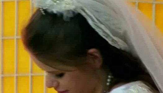 Horn-mad bride in loose gown Jenny provides her husband with a blowjob porn pics