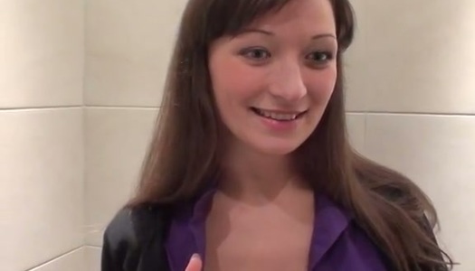 Cute brunette chick sucks two sticks in the public toilet porn pics