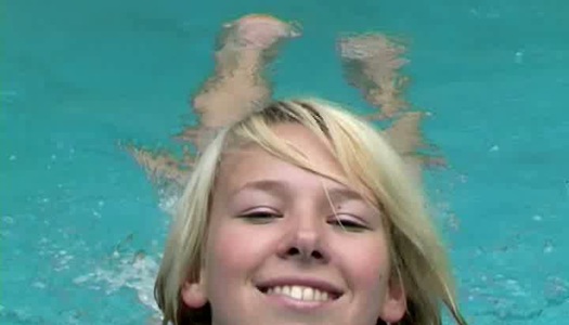 Juicy teen Kessy is playing with toy by pool side porn pics