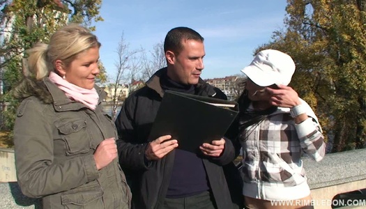 Two rapacious sluts tongue fuck each other in front of horny dude in FFM sex video porn pics