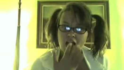 Buxom ugly light haired bitch with pigtails masturbates madly on webcam porn pics