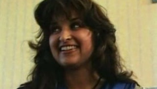 She is in her dress on the couch thinking of stripteasing porn pics