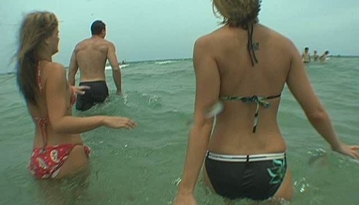 Two alluring students swim in ocean with a brutal dude porn pics