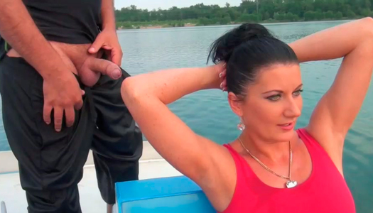 Juicy black haired babe in swimming suit gets wild on the boat porn pics