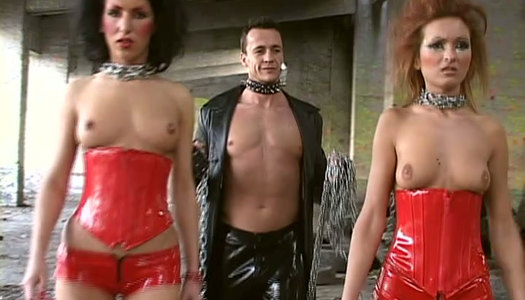 Tough master plays with two submissive girls in dirty FFM threesome porn pics