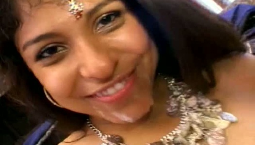 Cheesecake Indian hussy gets her face cumshot in solo sex scene porn pics