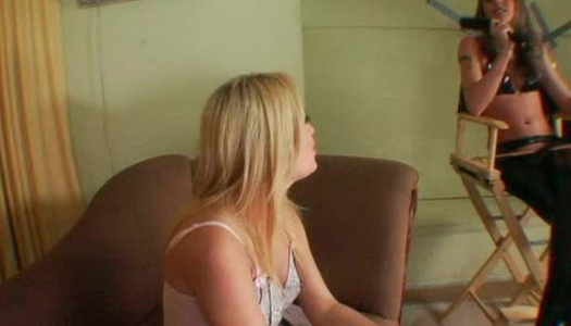 Straight haired blondie Brynn sits on the couch and poses on cam porn pics