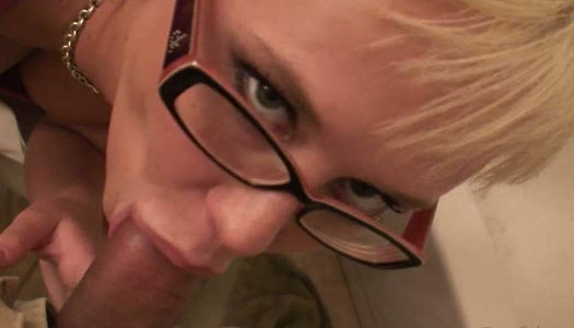 Blonde bitch Carly Parker wearing glasses gives blowjob porn pics