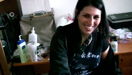 Sex-starved brunette trollop fingers her pussy in hot solo scene porn pics