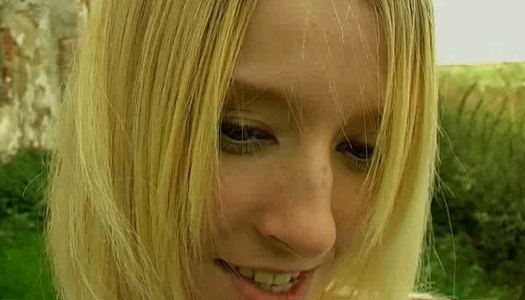 Skinny Russian whore is poking her twat with dildo outdoor porn pics