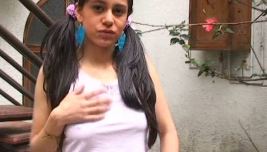 Cute brunette teen digs playful fingers in panties porn pics