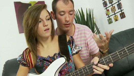 Young brunette is making love with her guitar teacher porn pics