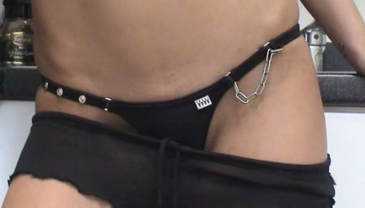 Skanky brunette teen strips and plays with herself in the kitchen porn pics