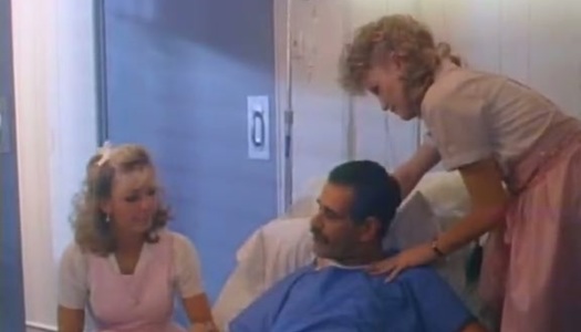 Lascivious nurses seduce their patient into a threesome porn pics