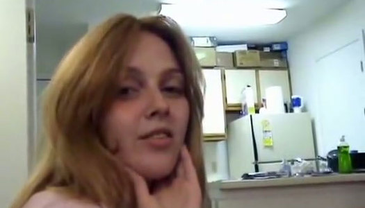 Charming red head babe with perky tits gives head in POV porn pics