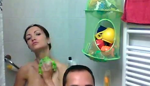 Handsome dude makes video of his amateur GF while she takes bath porn pics