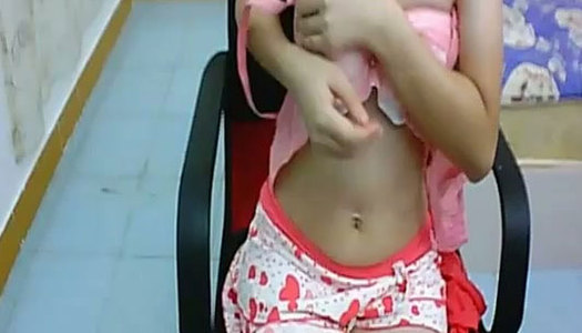 Lean Asian webcam girl shows off her small tits with pleasure porn pics