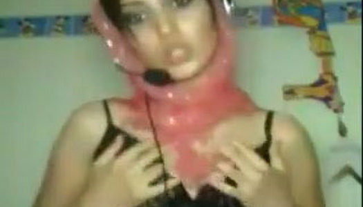 Pretty Asian brunette talks on webcam with her buddy porn pics