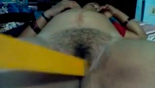 Slutty whore gets her hairy snatch fucked with a ruler porn pics