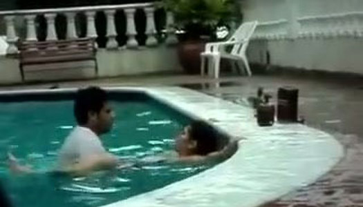 Shameless couple caught having sex in a public pool porn pics