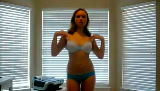 Curvaceous amateur MILF strips seductive for camera porn pics