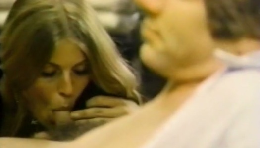 Sizzling hot blondie in black stockings gives her lover a nice blowjob porn pics