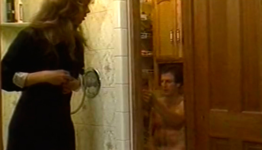 Gorgeous blonde masturbates her pussy while spying her husband in a toilet porn pics