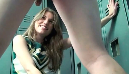 Raunchy cheerleader kicks dude's balls in the locker room porn pics