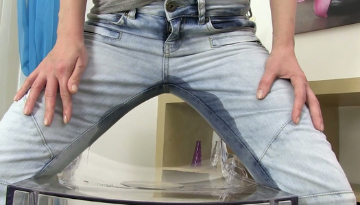 Denisa Peterson pisses in her jeans and then drinks her own urine porn pics