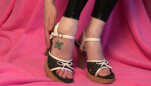 Riley Rebel caresses her sexy feet wearing high heels shoes porn pics