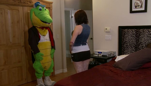 Horny black stripper in big toy mask gets BJ from busty pale brunette porn pics