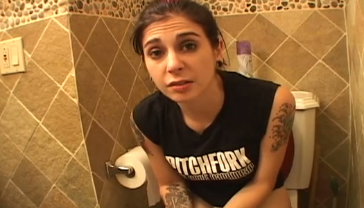 Slutty amateur brunette girlie is caught pissing in the toilet porn pics