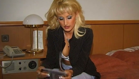 Hot blonde pornstar with natural boobs Zora Banx strips and shows off on a camera porn pics