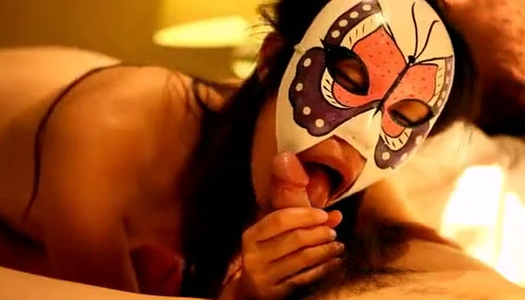 Skinny Asian chick puts on her mask and takes on two hard cocks at once porn pics