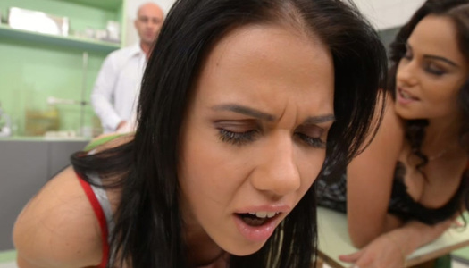 Wondrous black haired chicks in lacy stockings give footjob to lucky doctor porn pics