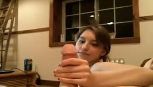 Sexy dark haired cutie blows thick cock of her feverish guy porn pics