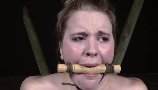 Spanked chick Kylie is punished din the dungeon porn pics