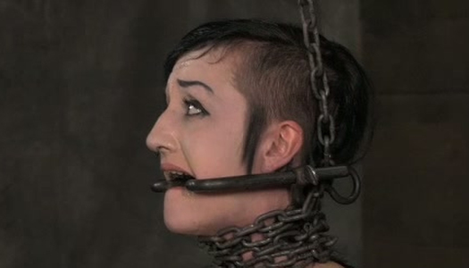 Master fucks her throat with big sex toy in the torture room porn pics