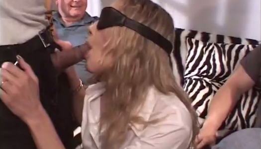 Blindfolded MILF fucks two horny studs while her hubby is watching porn pics