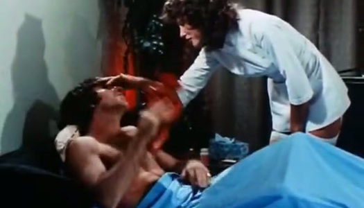 Brunette whore Linda Lovelace gives deepthroat blowjob to Harry Reems porn pics