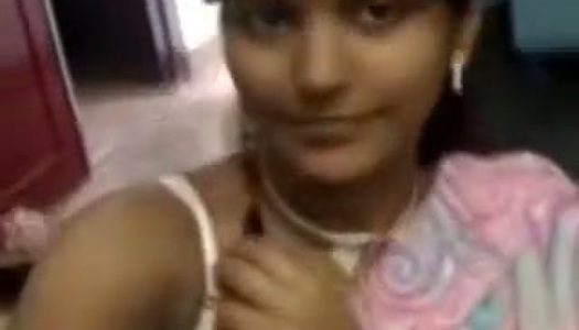 Dirty-minded amateur Indian dark haired woman flashes her boobs on cam porn pics