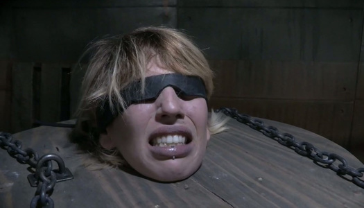 Tied up nude chick is punsihed in dark torture room porn pics